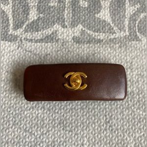 Vintage Chanel brown leather cc turnlock hair clip